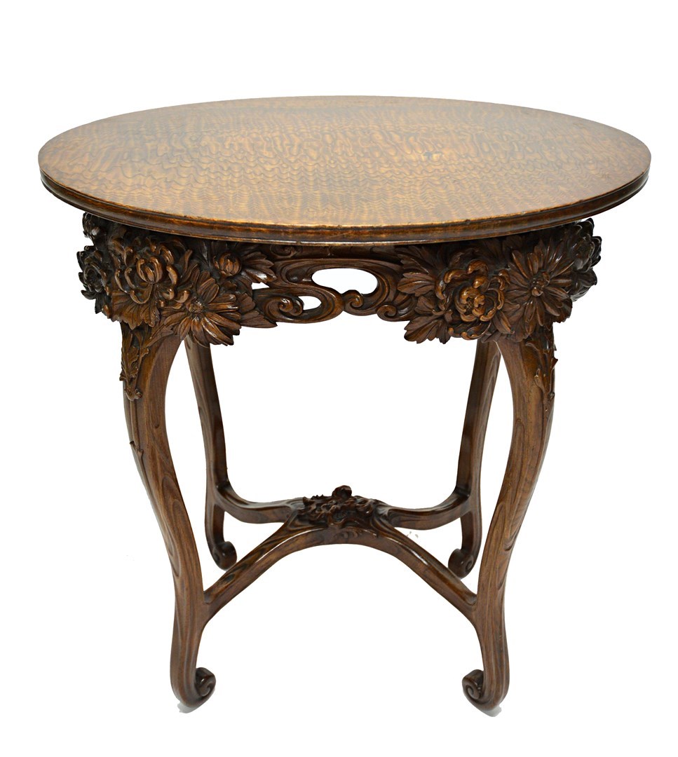 Appraisal: An Art Nouveau ash occasional table the figured oval top