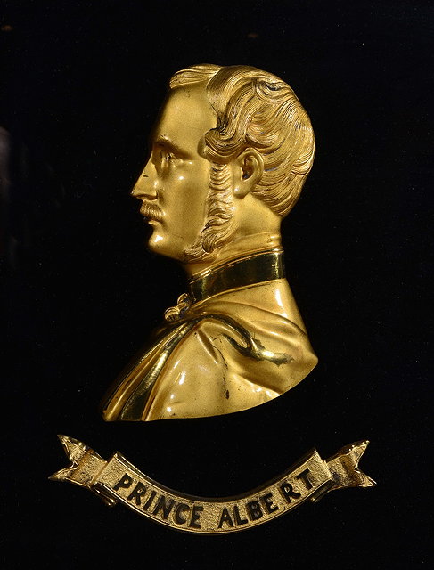 Appraisal: Victorian gilt metal relief portrait bust of Wellingtonin a rosewood