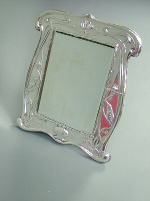 Appraisal: A silver Art Nouveau easel mirror by William Neale Sons