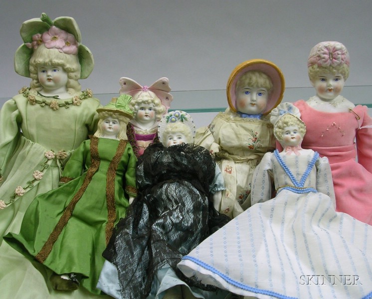 Appraisal: Seven Bisque Bonnet Head Dolls probably Hertwig Germany wearing a