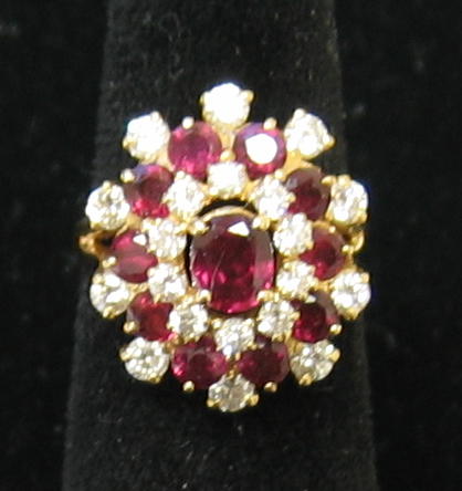 Appraisal: DIAMOND AND RUBY RING k yellow gold lady's rig with