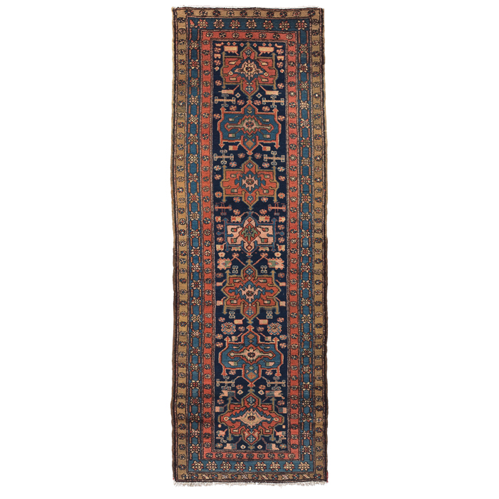 Appraisal: Northwest Persian runner c floral design on a blue field