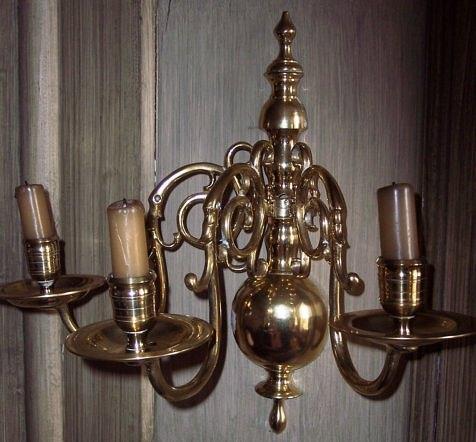 Appraisal: A pair of th Century Dutch style brass three-branch wall