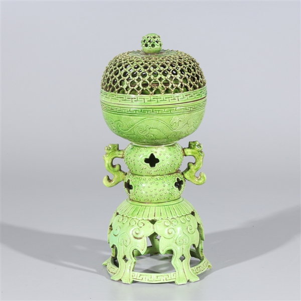 Appraisal: Chinese two-piece green glazed porcelain incense burner with molded handles