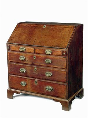 Appraisal: A George III oak bureau with mahogany banding the shaped