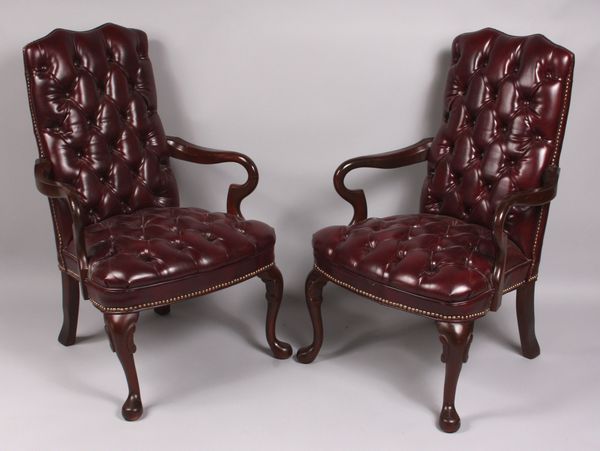 Appraisal: Pair of th Century burgundy tufted back mahogany armchairs h