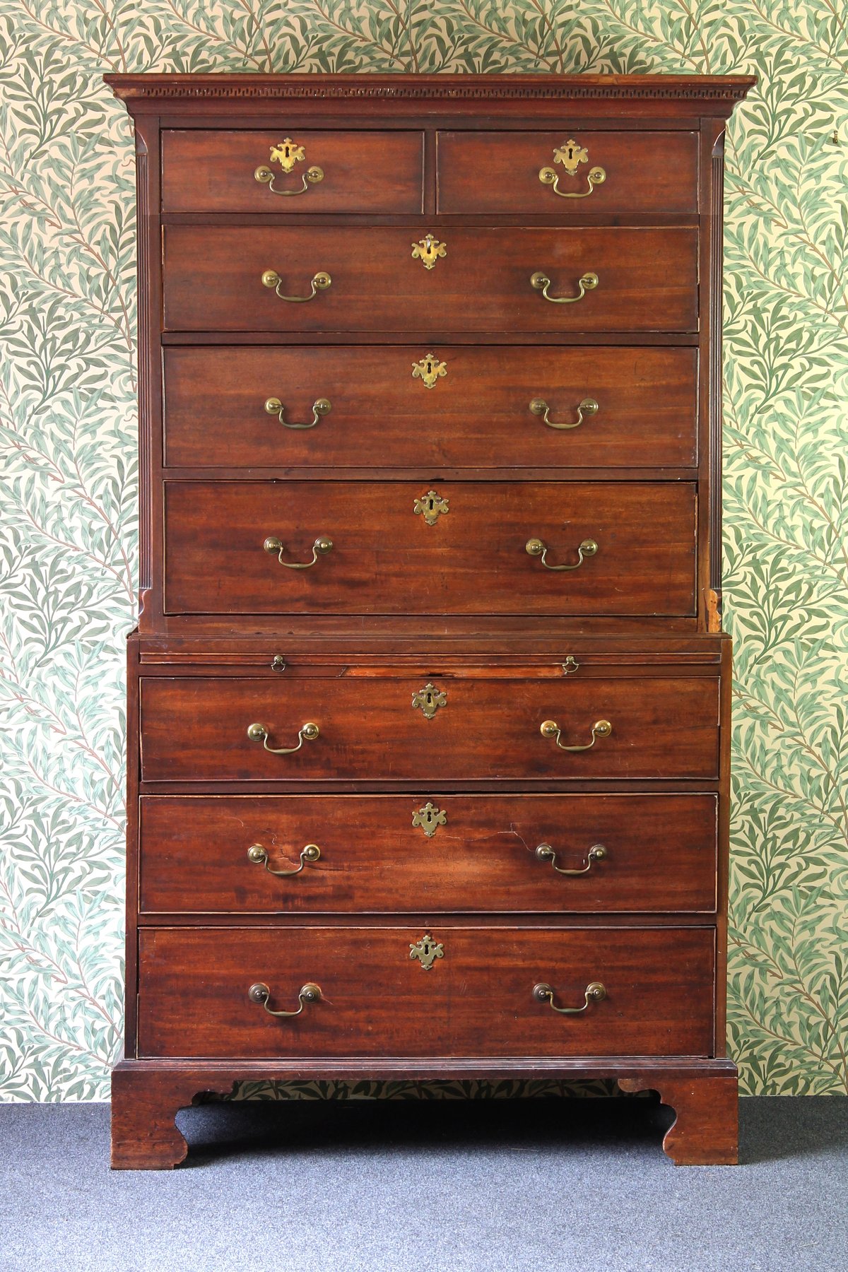 Appraisal: An th Century mahogany tallboy chest the top with dentil