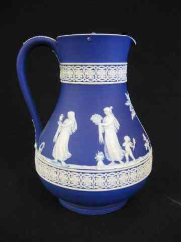 Appraisal: Wedgwood Dark Blue Jasperware Pitcher classical maidens in garden elaborate