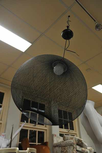 Appraisal: A LARGE CIRCULAR 'MOOI' HANGING LIGHT IN BLACK