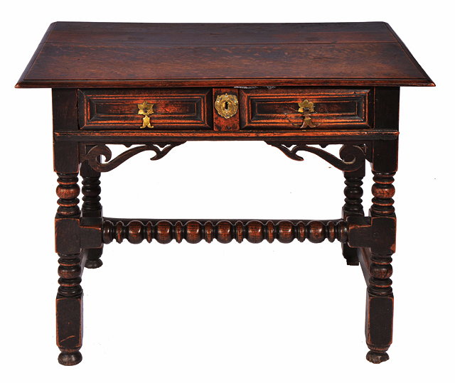 Appraisal: A TH CENTURY OAK SIDE TABLE the single frieze drawer