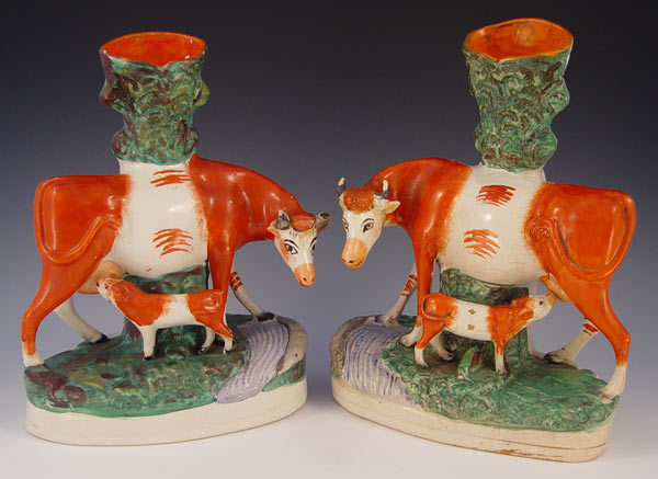 Appraisal: PAIR OF TH C STAFFORDSHIRE COW AND CALF SPILL VASES