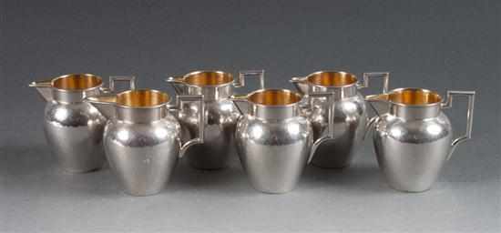 Appraisal: Six German hammered silver miniature cream jugs one marked ''Meister''