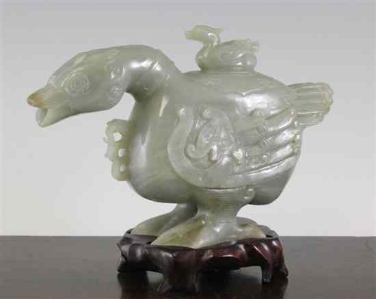 Appraisal: A Chinese green jade vessel and cover in the form