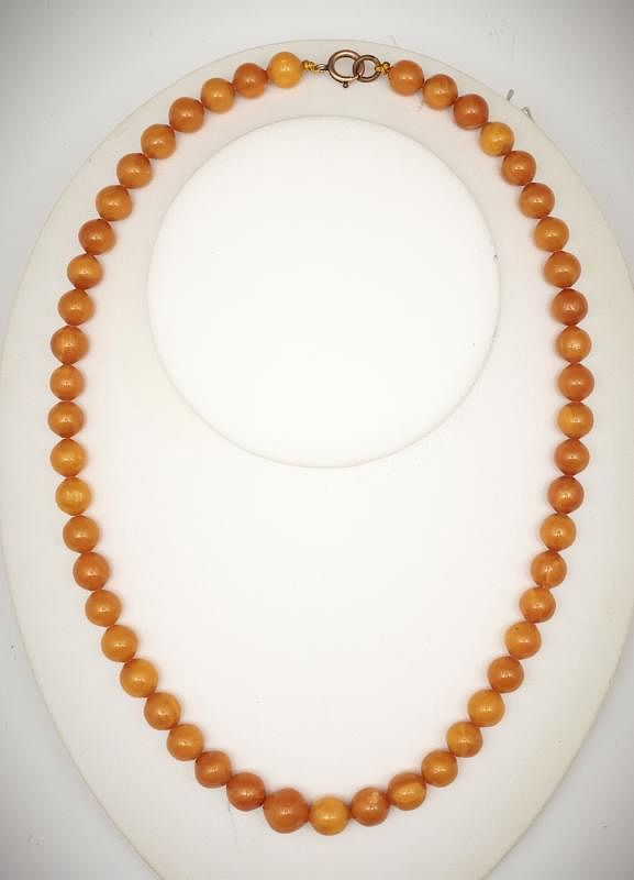 Appraisal: Golden Amber Necklace Golden Amber Necklace Comprising golden honey colored