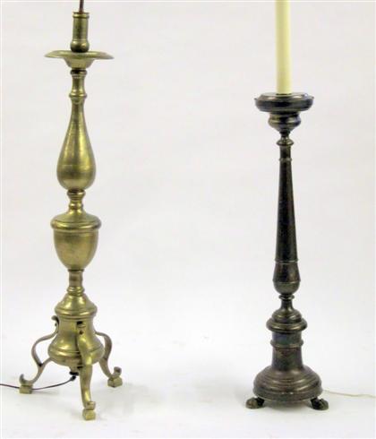 Appraisal: Two Baroque style brass and bronze floor lights The first