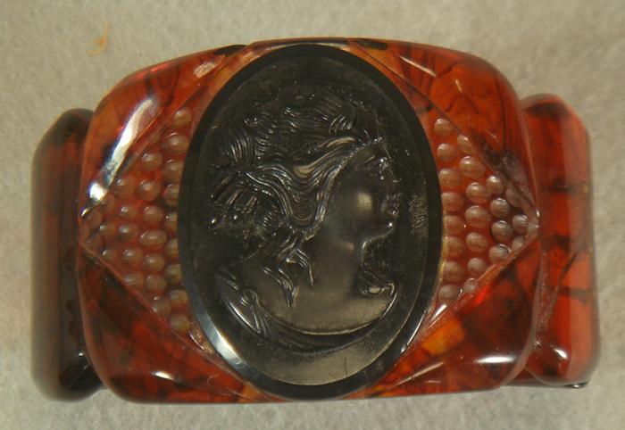 Appraisal: Amber faux tortoise hinged bangle cameo bracelet x id Estimate