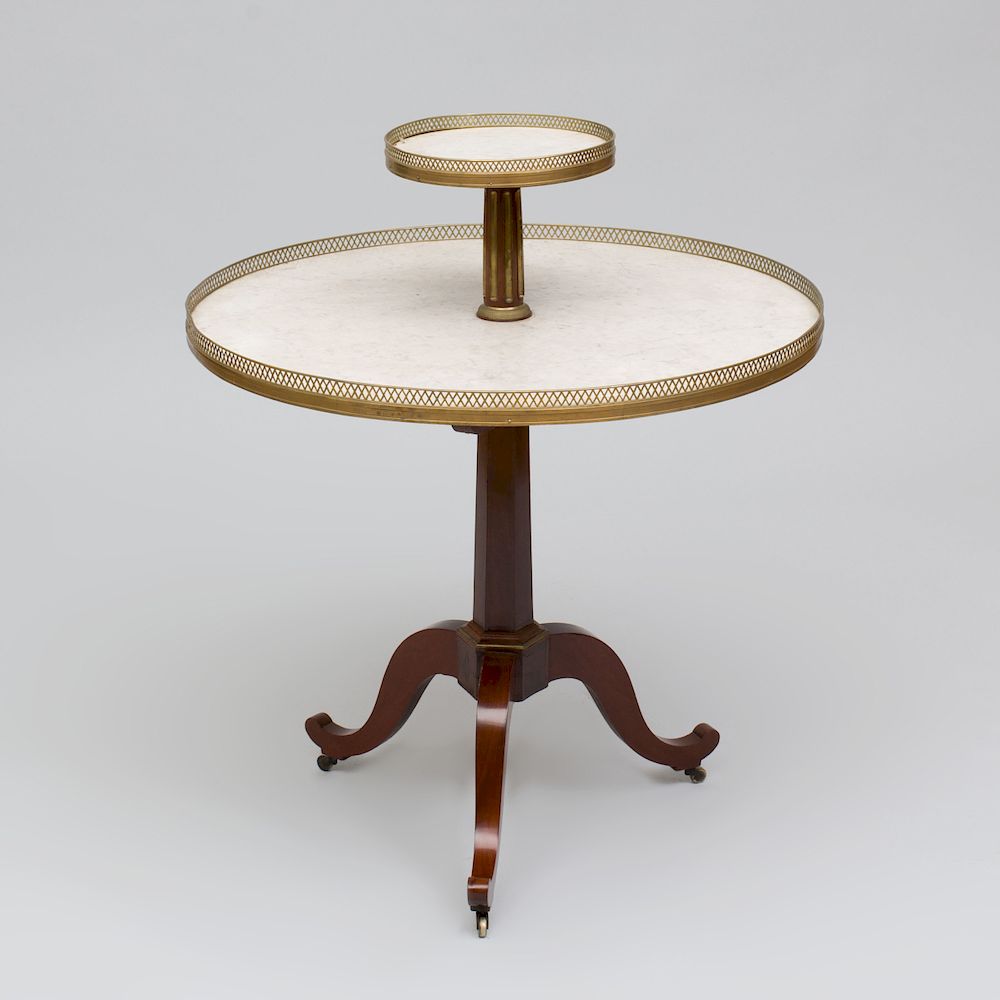 Appraisal: Directoire Brass-Mounted Mahogany Two-Tiered Gu ridon The legs are later