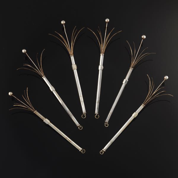 Appraisal: SIX SILVER COCKTAIL STIRRER SWIZZLE STICK RETRACTABLE PENDANTS closed fully