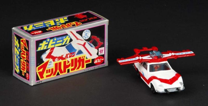 Appraisal: Mach Baron Vehicle Mach Triger Description Japanese Made by Popy