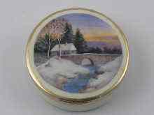 Appraisal: A circular box with a rural enamel scene on gilded