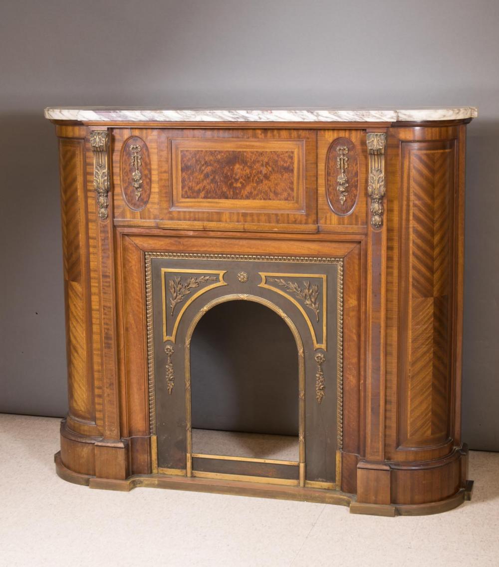 Appraisal: LOUIS XVI STYLE ORMOLU MOUNTED MAHOGANY FIREPLACE FRONT Continental early