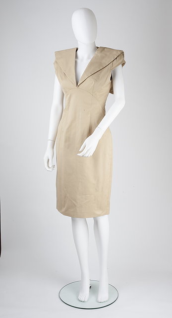 Appraisal: An Alexander McQueen cream cotton occasion dress deep v-shaped neckline