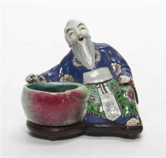 Appraisal: A Chinese Porcelain Figural Coupe likely th century depicting a