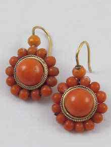 Appraisal: A pair of antique gilt metal coral bead earrings approx