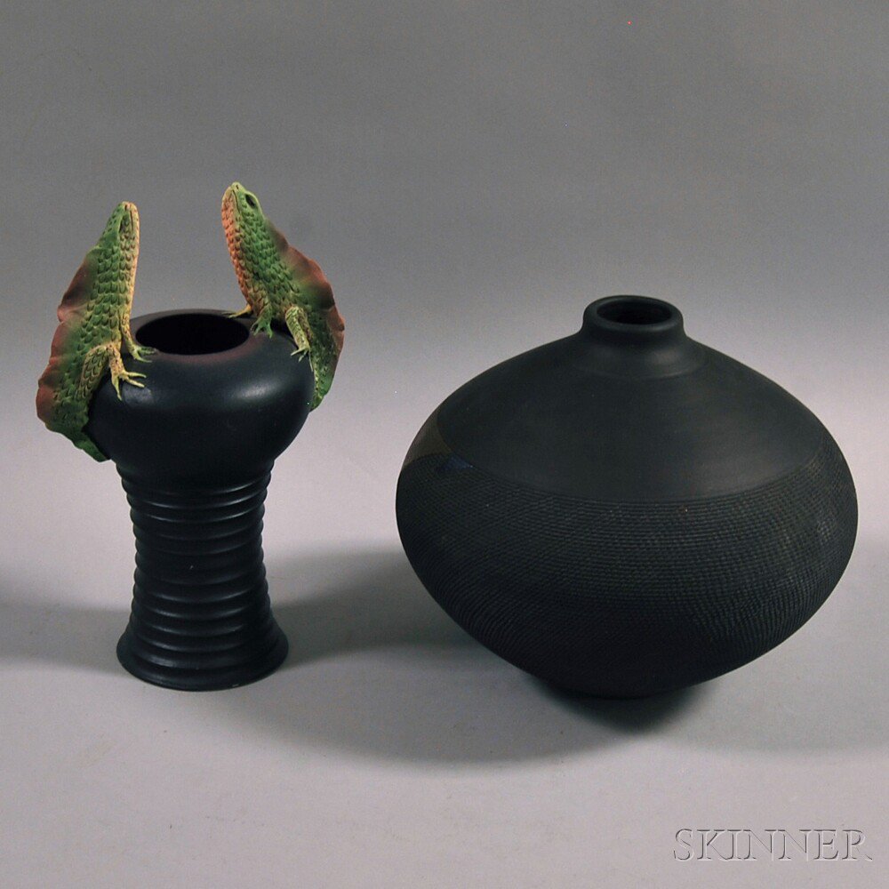 Appraisal: Two Art Pottery Vases late th century a black Raku-style