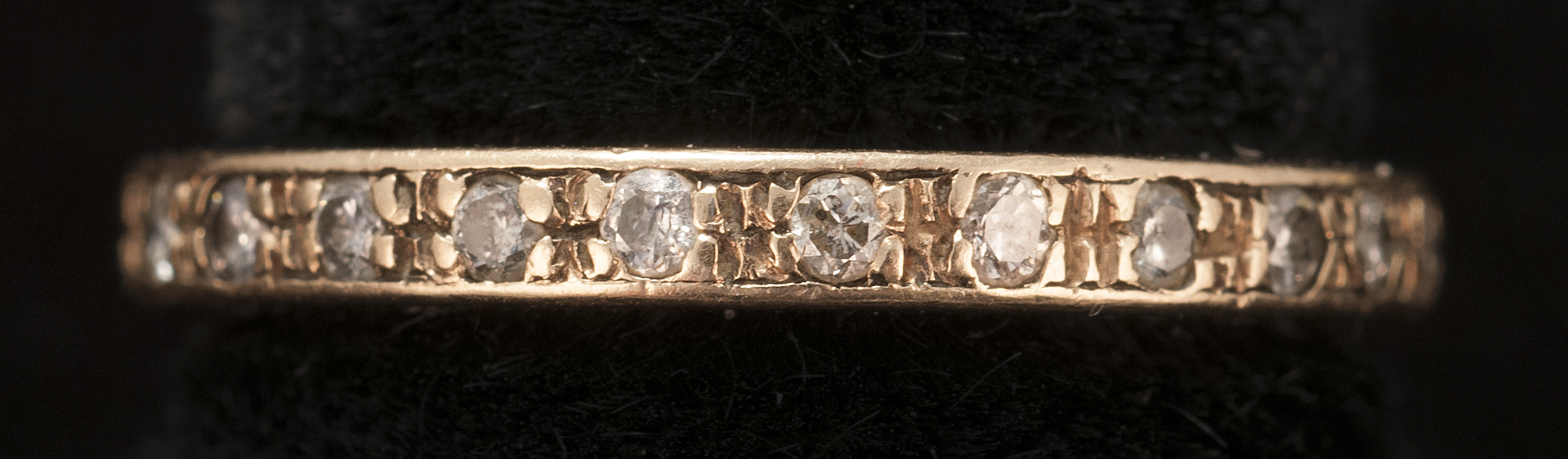 Appraisal: YELLOW GOLD AND DIAMOND ETERNITY RING Size ConditionUndamaged