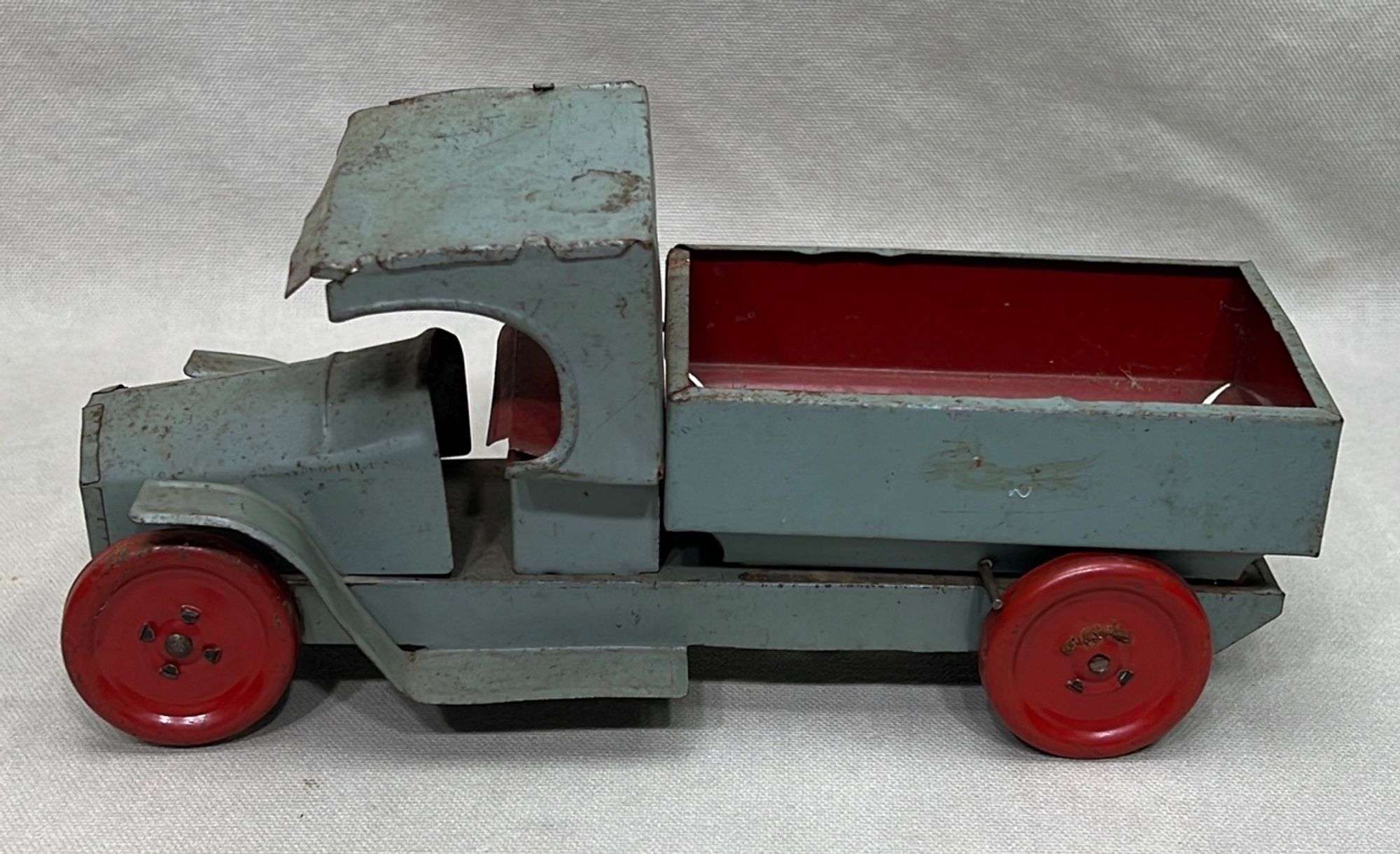 Appraisal: American tin truck toyearly th century appx overall length