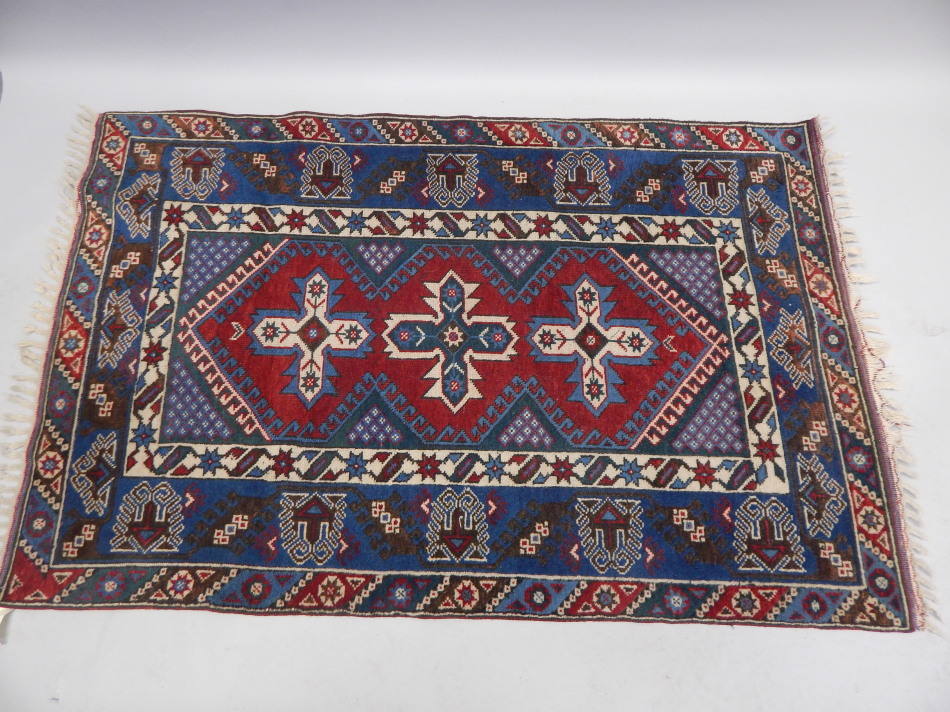 Appraisal: A Turkish type rug with a design of medallions on