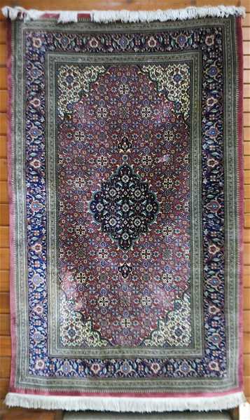 Appraisal: WEAVER SIGNED PERSIAN SILK AREA RUG hand knotted floral and