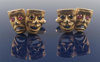 Appraisal: A pair of gold comedy and tragedy mask cufflinks the