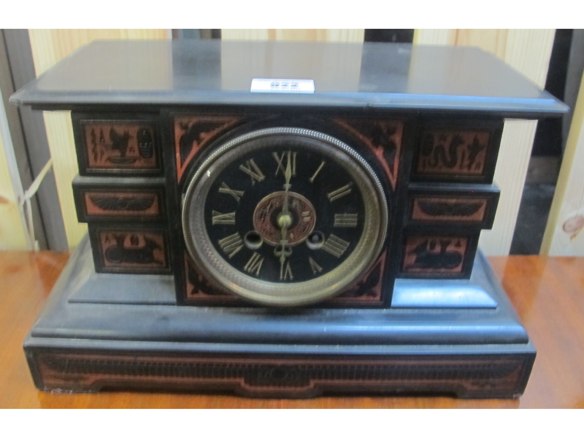 Appraisal: A Victorian Egyptianesque black slate mantel clock