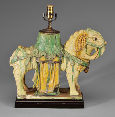 Appraisal: Chinese tileworks elephant green ocher and straw glazed caparisoned beast