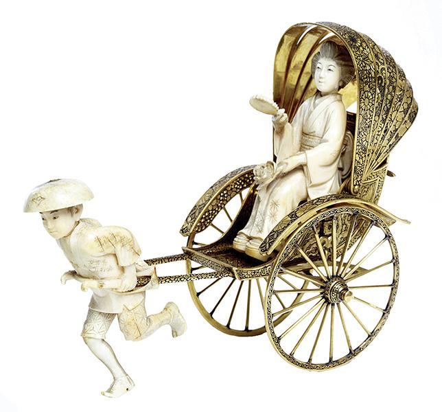 Appraisal: A JAPANESE BRONZE GILT AND IVORY OKIMONO OF A BARE-FOOTED