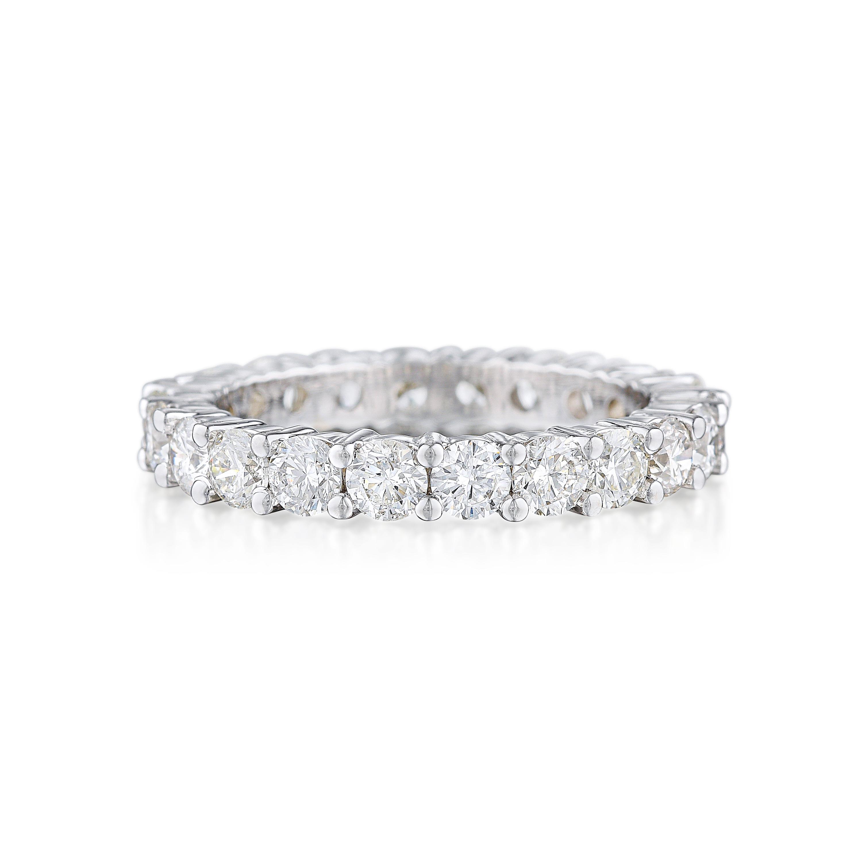 Appraisal: DIAMOND ETERNITY BAND Crafted in K white gold set with