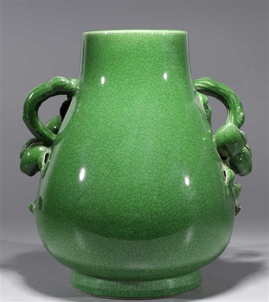 Appraisal: Chinese green glazed porcelain vase with elaborately molded peach form