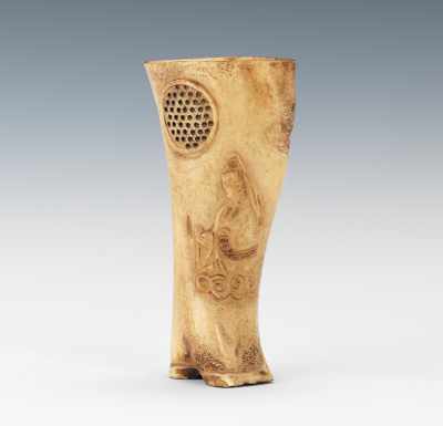 Appraisal: A Carved Animal Bone Brush Holder Natural form with delicately