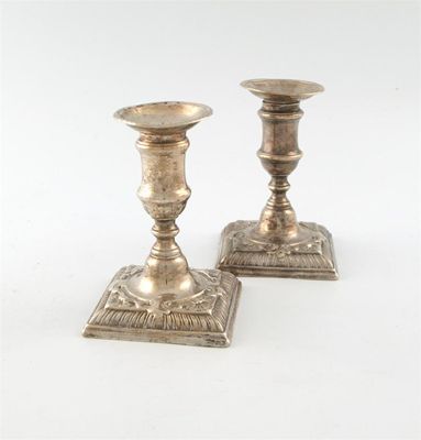 Appraisal: A pair of George III dwarf candlesticks by W Chatterton