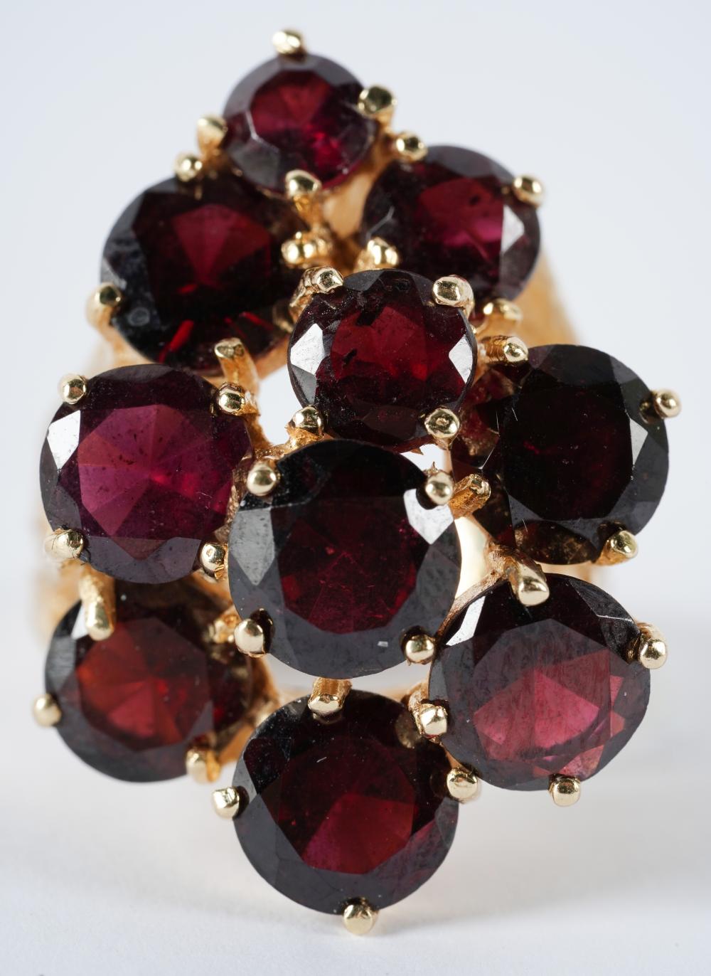 Appraisal: KARAT YELLOW GOLD GARNET RINGcomprising ten round cut garnets approximate