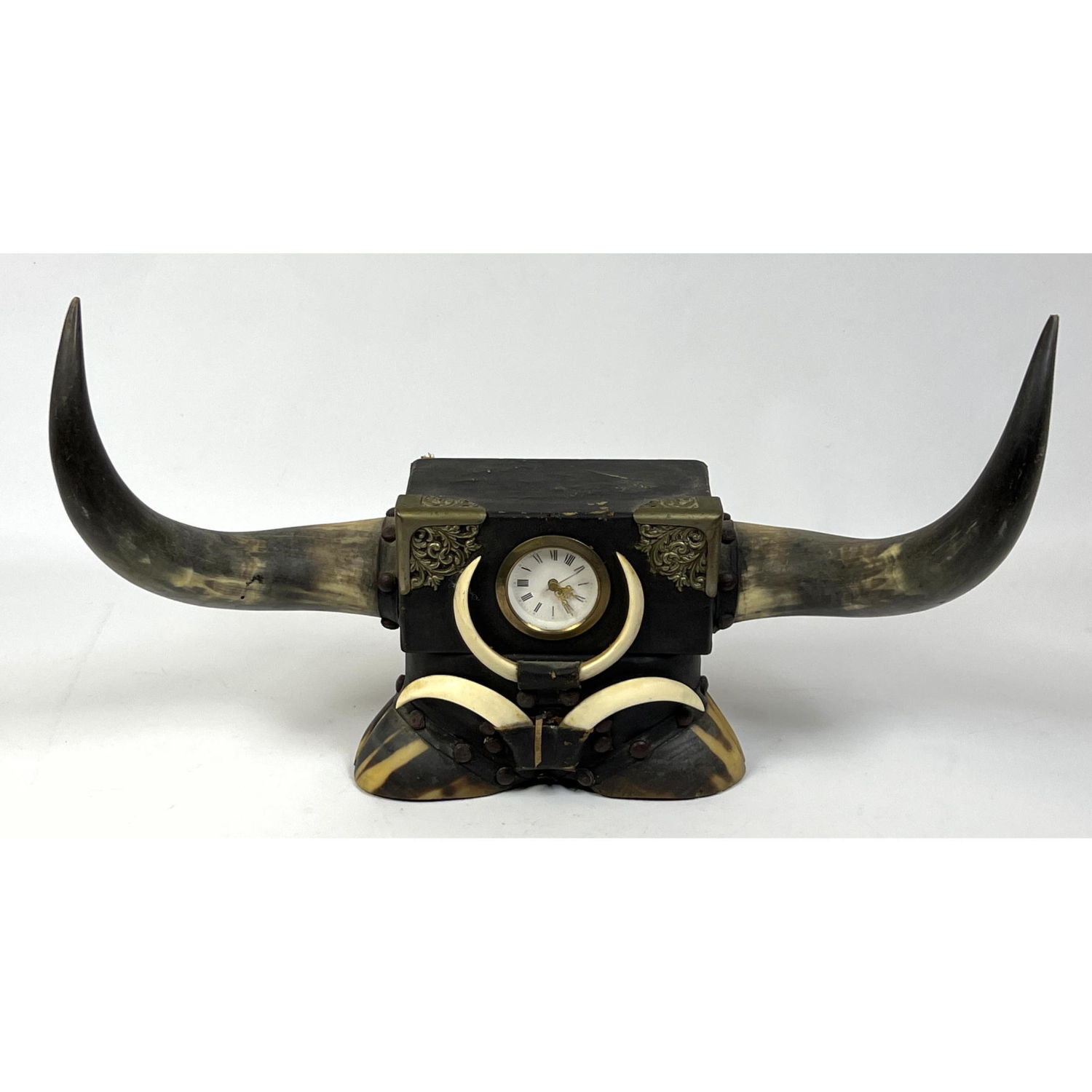 Appraisal: Highly Unusual Safari Trophy style Clock Elements include Steer Horns