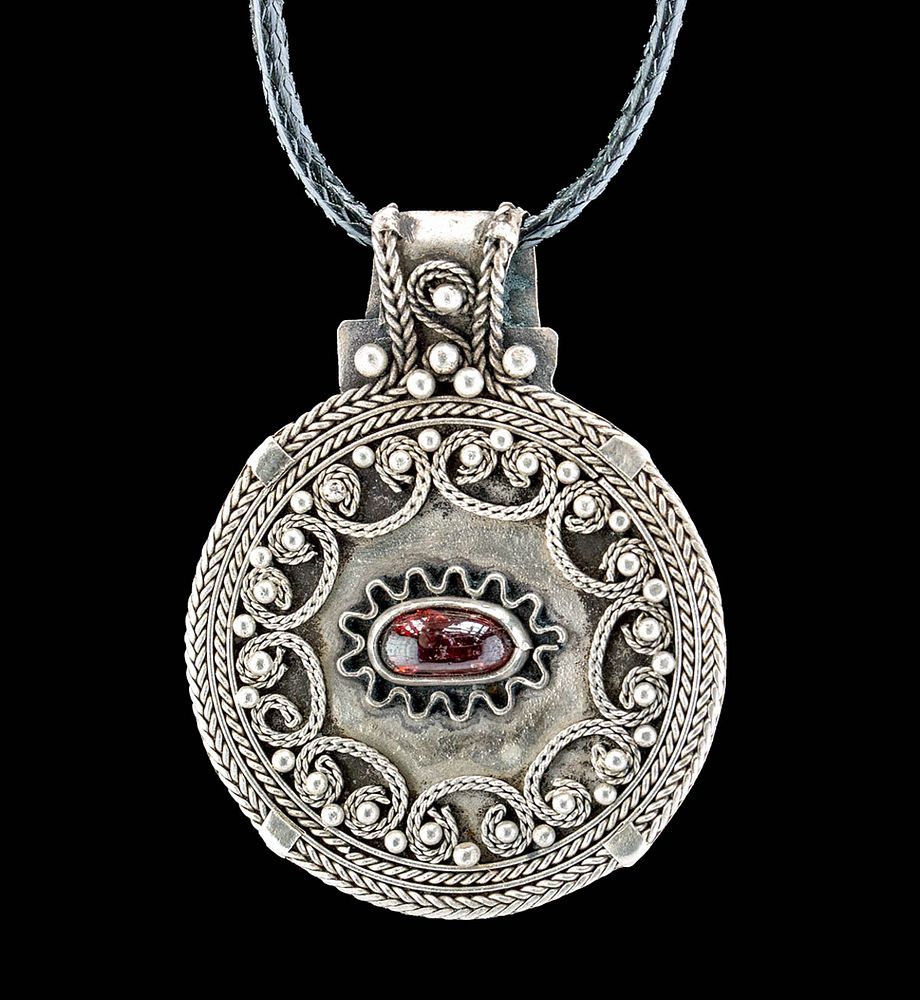 Appraisal: Viking Silver Bracteate Pendant w Garnet Cabochon Northern Europe Viking