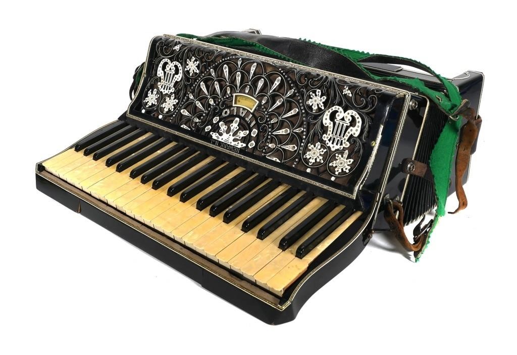 Appraisal: Italo piano accordion featuring treble keys and registers and bass