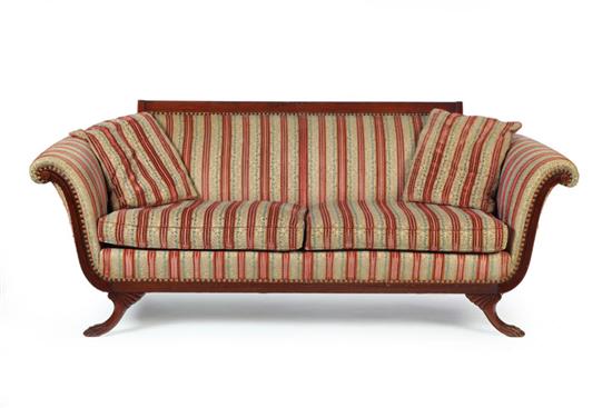 Appraisal: DUNCAN PHYFE STYLE SOFA Walnut with rolled arms reeded skirt