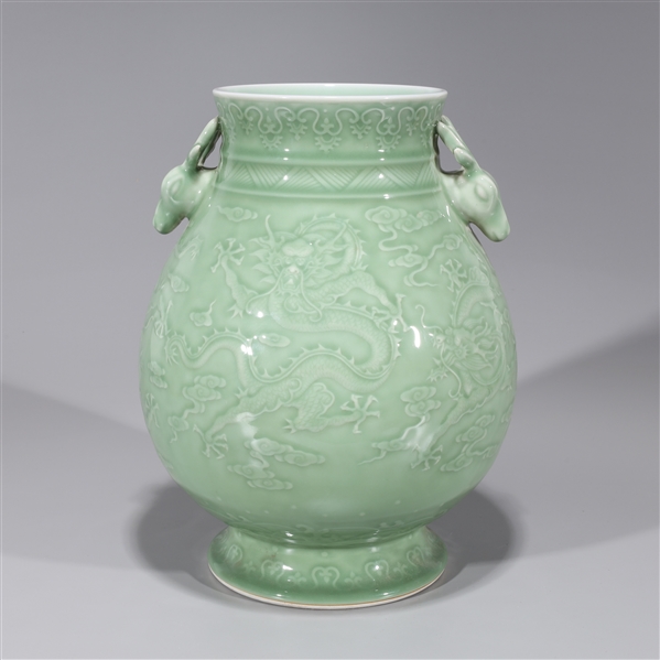 Appraisal: Chinese Qianlong style celadon porcelain vase depicting dragons amidst clouds