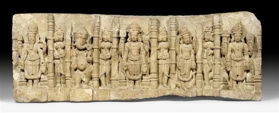 Appraisal: A BUFF SANDSTONE FRIEZE SHOWING FIVE MALE DEITIES WITH FEMALE