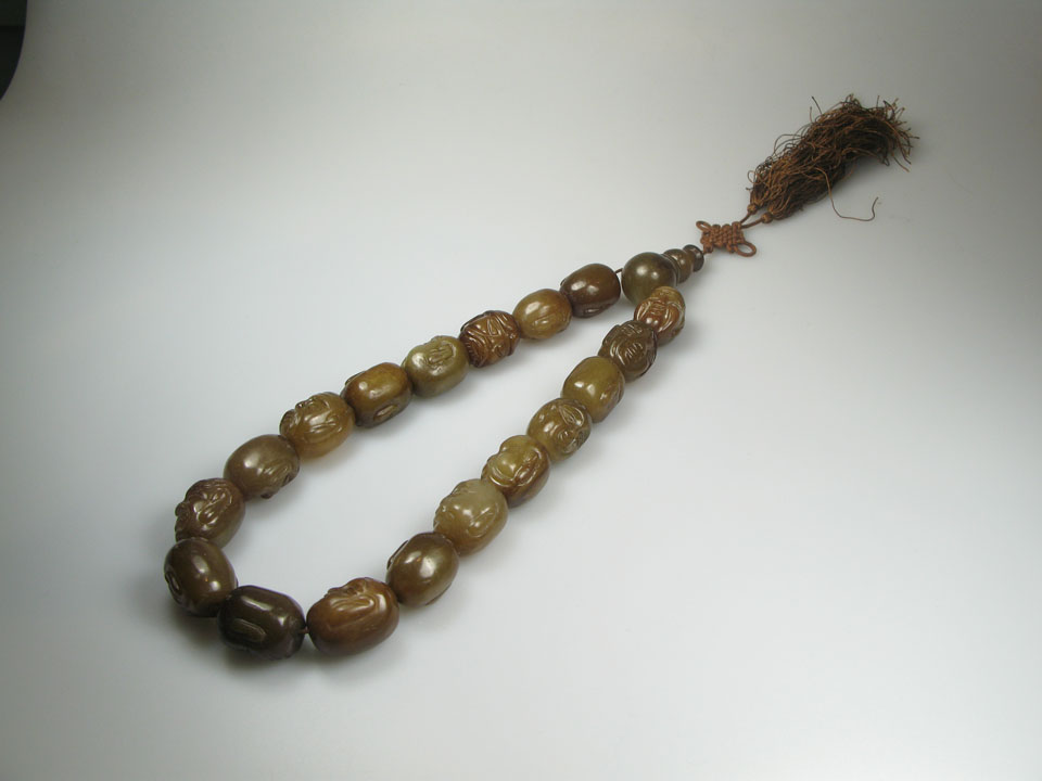 Appraisal: Carved Jade Prayer Beads and a termination bead strung with