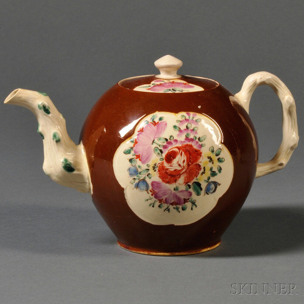 Appraisal: Staffordshire Cream-colored Earthenware Teapot and Cover England c globular with